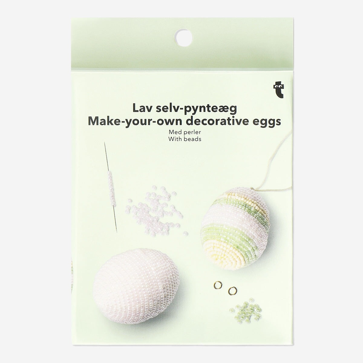 DIY Easter eggs with glass beads for crafting, colorful hobby project from Flying Tiger Copenhagen, featuring decorated eggs.