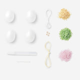 DIY Easter eggs with glass beads from Flying Tiger Copenhagen, showcasing colorful decorated eggs for craft projects.