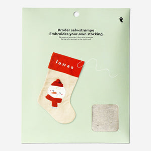 DIY embroidered stocking from Flying Tiger Copenhagen, showcasing colorful embroidery on a festive fabric Christmas stocking.