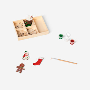 DIY wooden Christmas decorations for hobby crafting by Flying Tiger Copenhagen, featuring rustic holiday-themed wooden ornaments.