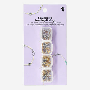 Jewellery findings kit from Flying Tiger Copenhagen including clasps, jump rings, and beads for jewelry making hobby projects.