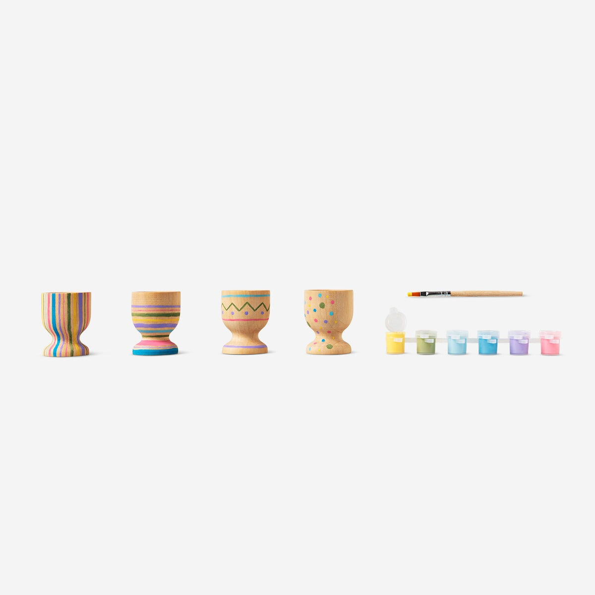 Paint-your-own egg cups hobby set by Flying Tiger Copenhagen, featuring blank ceramic egg cups for decorating.