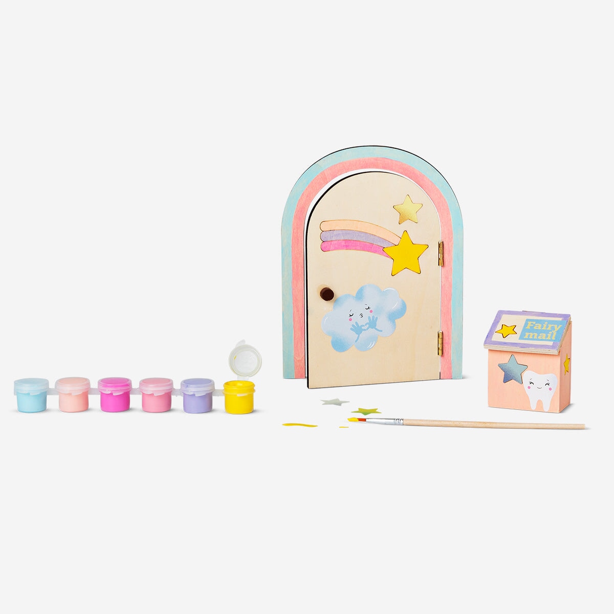 Paint-your-own fairy door hobby kit by Flying Tiger Copenhagen featuring a wooden door and colorful stickers for creative decorating.