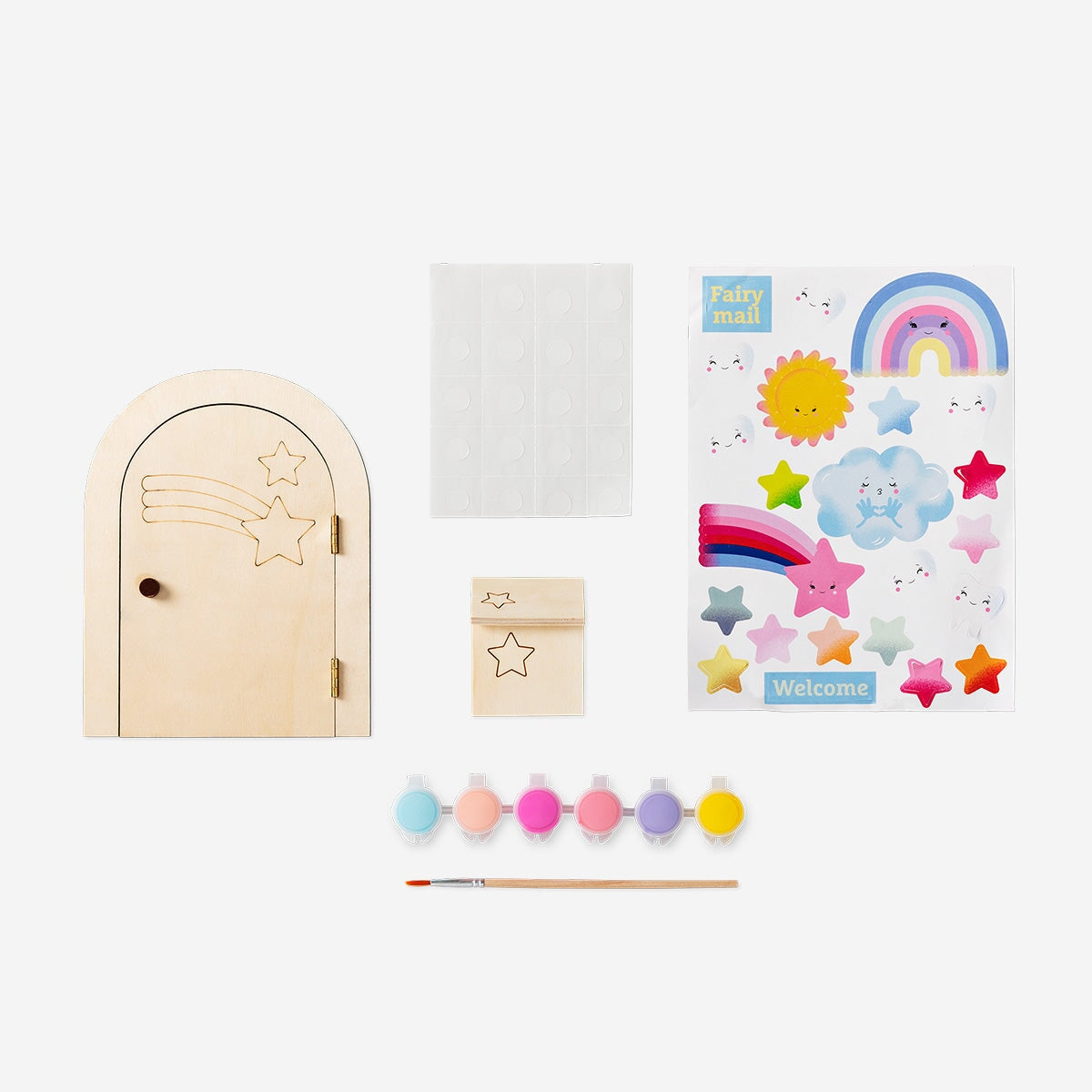 Paint-your-own fairy door hobby kit with colorful stickers from Flying Tiger Copenhagen, designed for creative crafting and decorating.