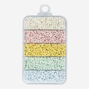 Pastel coloured glass beads mix for crafting hobbies by Flying Tiger Copenhagen, featuring various pastel shades and sizes.