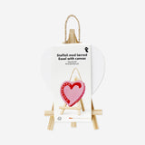 Klein hart canvas met schildersezel