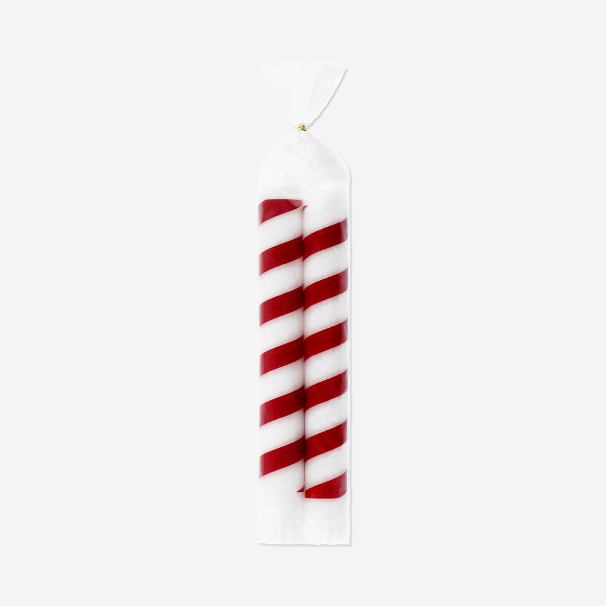 Two Candy Cane dinner candles from Flying Tiger Copenhagen, red and white striped holiday-themed home decor candles.