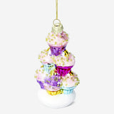 Christmas bauble cupcake stand by Flying Tiger Copenhagen, decorated with colorful cupcakes for festive holiday display.