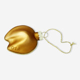 Flying Tiger Copenhagen Christmas bauble shaped like a fortune cookie for home holiday decoration.
