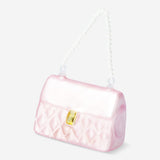 Pink Christmas bauble shaped like a purse, decorative holiday ornament from Flying Tiger Copenhagen for festive home decor.