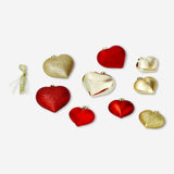 Set of 16 Flying Tiger Copenhagen Christmas baubles in red, gold, and silver for festive home decorating.
