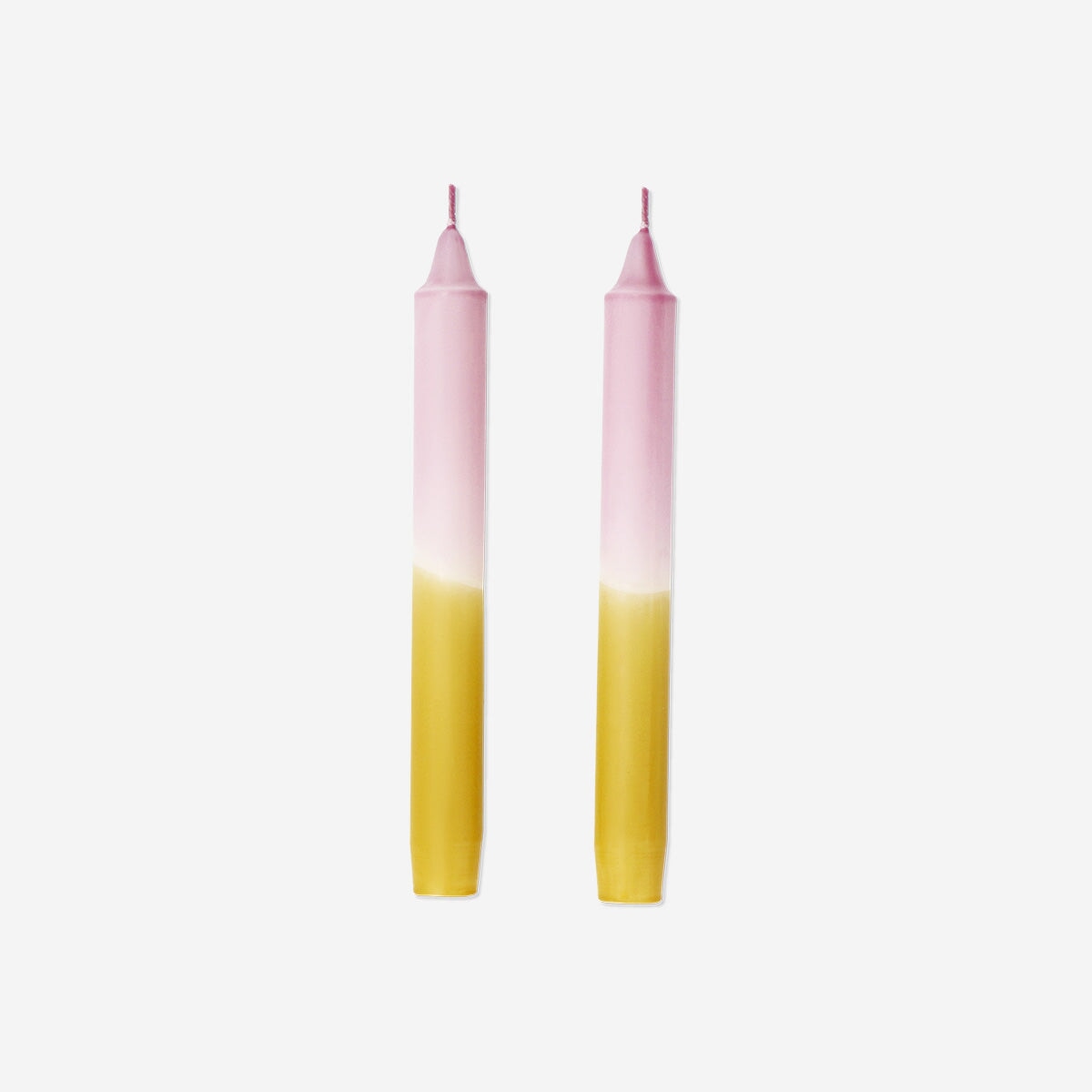 Set of 20 cm dip dye dinner candles in vibrant colors, ideal for home décor, by Flying Tiger Copenhagen.