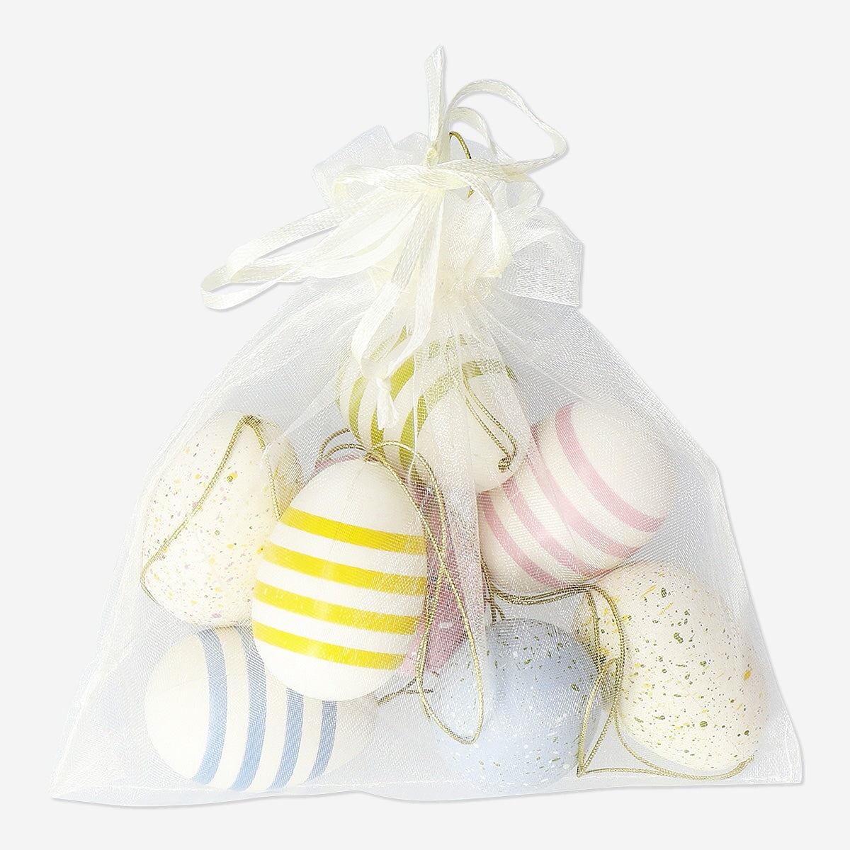 Set of six Easter egg ornaments with colorful stripes and dots from Flying Tiger Copenhagen for home decoration.