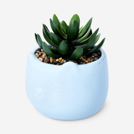 Faux succulent in blue ceramic pot