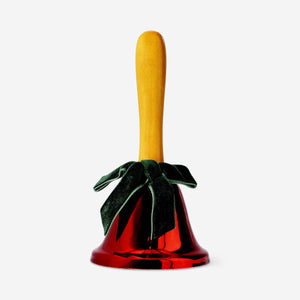 Green and red Flying Tiger Copenhagen handbell for home use, with a metallic handle and colorful bell body.
