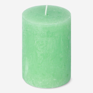 Green rustic pillar candle from Flying Tiger Copenhagen, 8 cm tall, ideal for home decor and creating cozy ambiance.