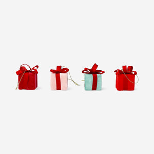 Set of four hanging gift decorations from Flying Tiger Copenhagen for home decor, featuring colorful, festive designs.