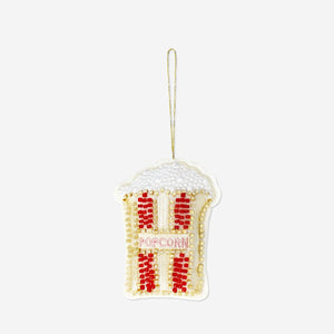 Hanging popcorn and bead ornament from Flying Tiger Copenhagen, decorative home accessory with colorful beads and popcorn details.