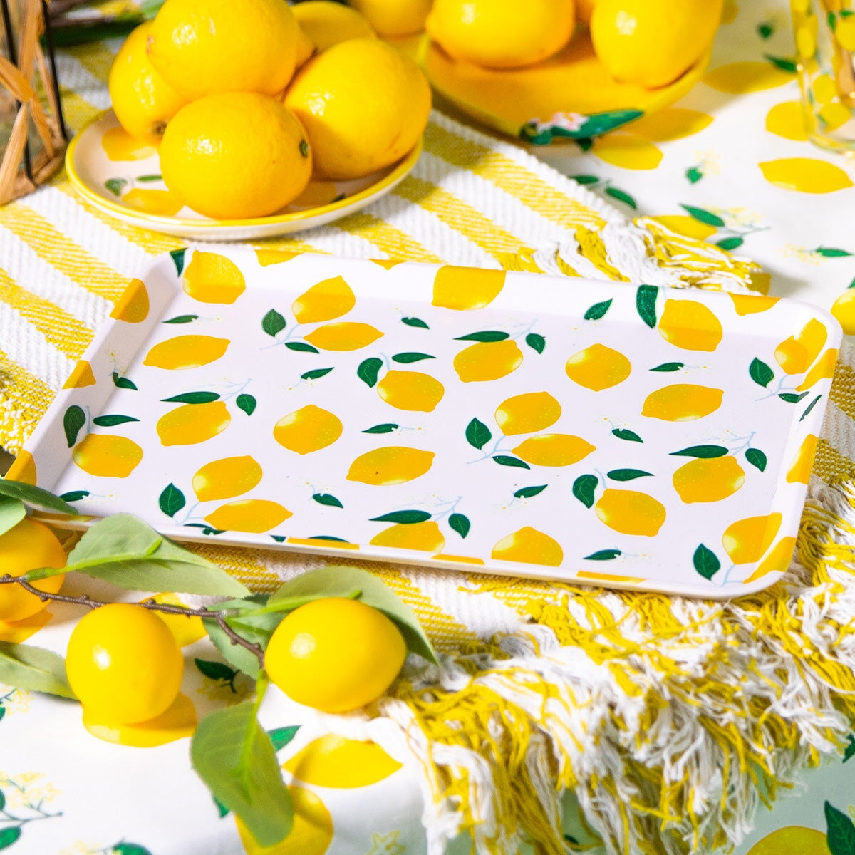 Flying Tiger Copenhagen lemon tray for home use, featuring a bright yellow citrus design on a ceramic surface.