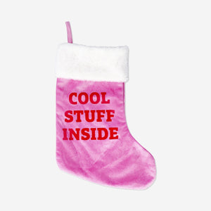 Pink Christmas stocking from Flying Tiger Copenhagen, decorated for the holiday season with a cozy, festive design.