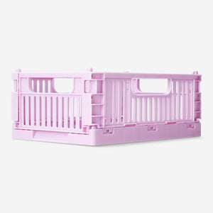 Pink collapsible storage box from Flying Tiger Copenhagen, 22 cm, made of lightweight, foldable material for home organization.