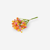 Pink decorative flower bouquet for home decor by Flying Tiger Copenhagen, featuring vibrant artificial flowers in a stylish arrangement.