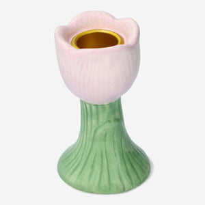 Pink tulip-shaped candle holder from Flying Tiger Copenhagen, decorative home accessory with floral design.