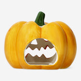 Pumpkin-shaped candle holder from Flying Tiger Copenhagen, decorative home accessory with a warm, festive design.