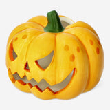 Pumpkin-shaped candle holder from Flying Tiger Copenhagen, designed for home decor, featuring a carved pumpkin design with a hollow center