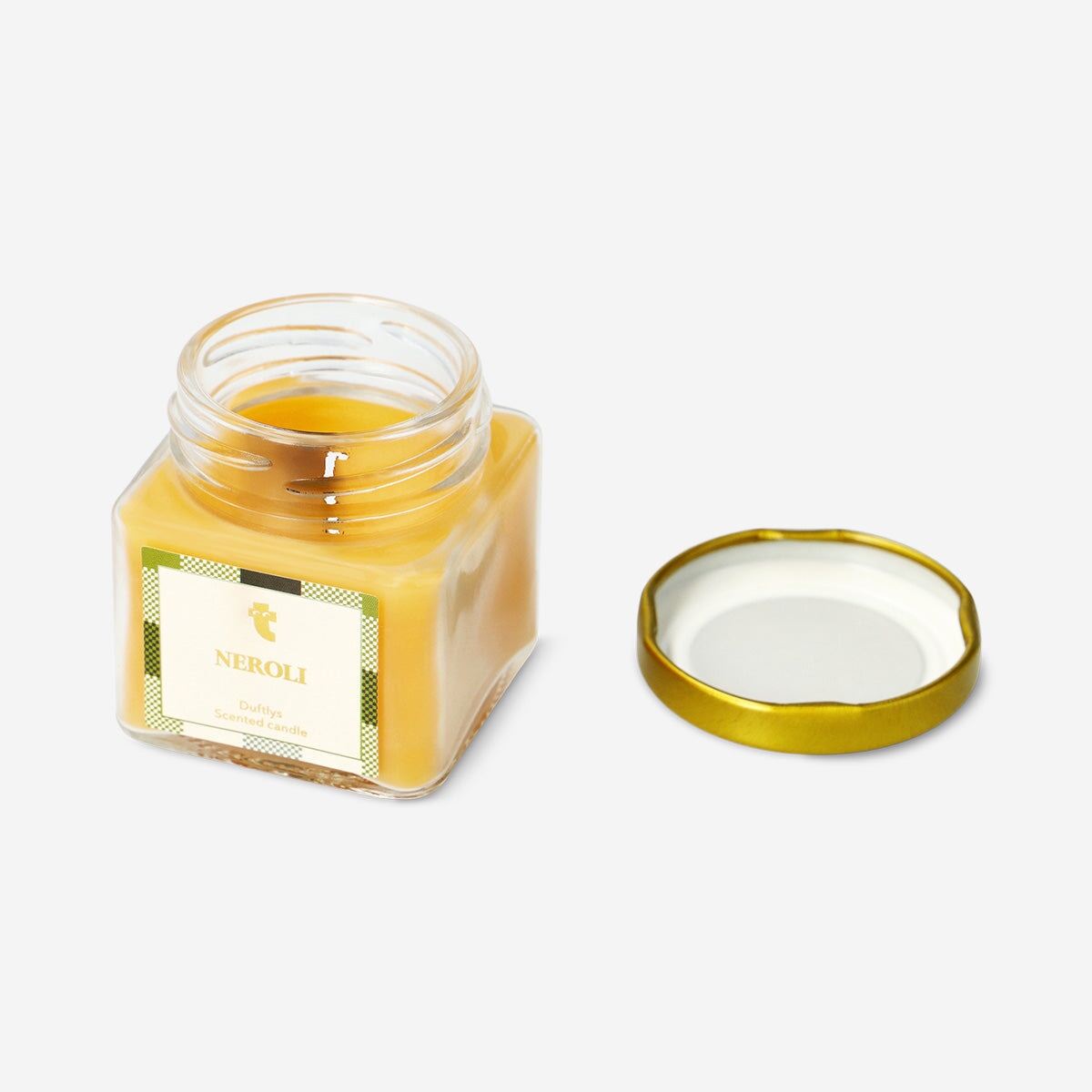 Flying Tiger Copenhagen scented candle with Neroli fragrance, featuring a glass jar and a soft, calming glow for home decor.