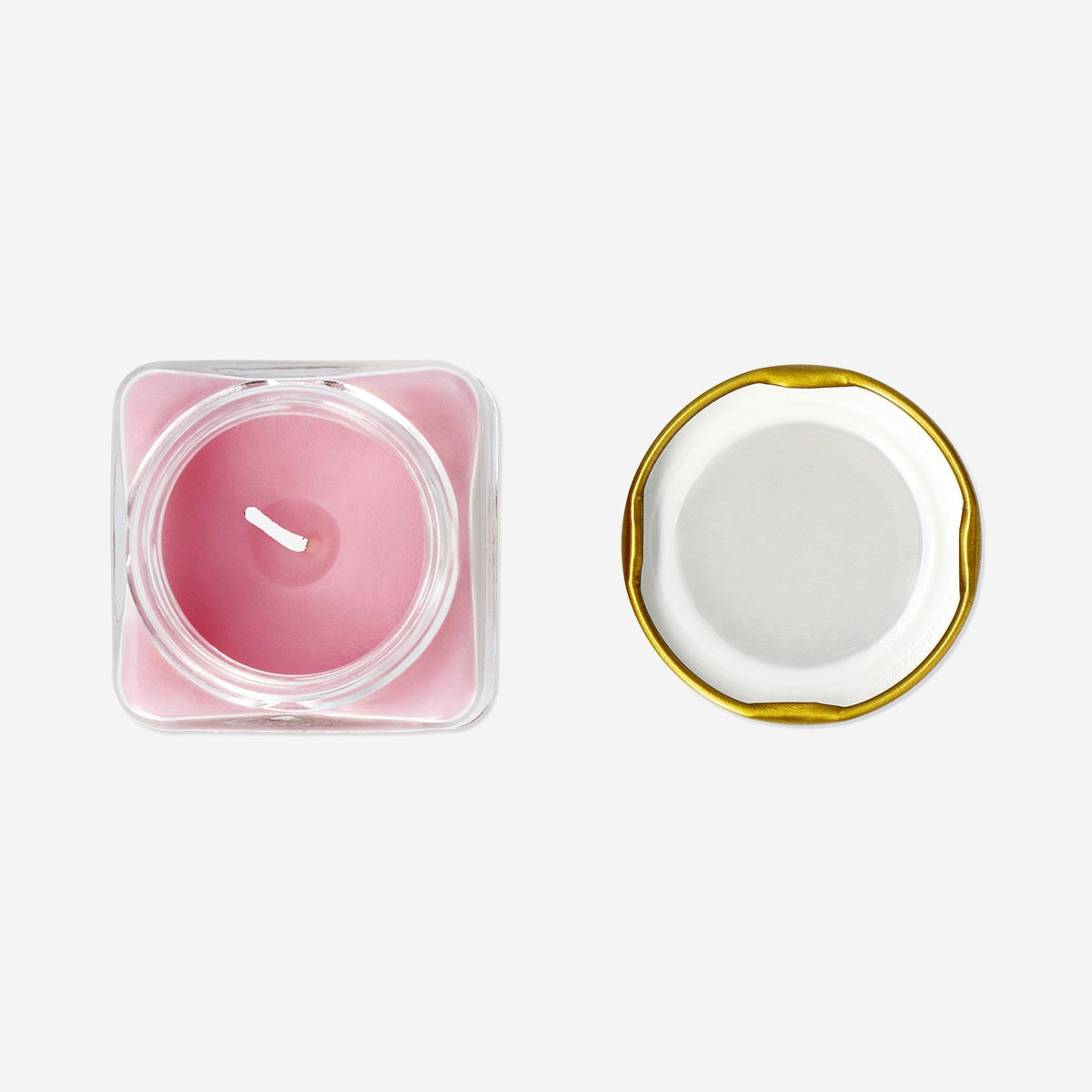 Flying Tiger Copenhagen scented candle with white musk and warm vanilla fragrance, in a glass holder for home decor.