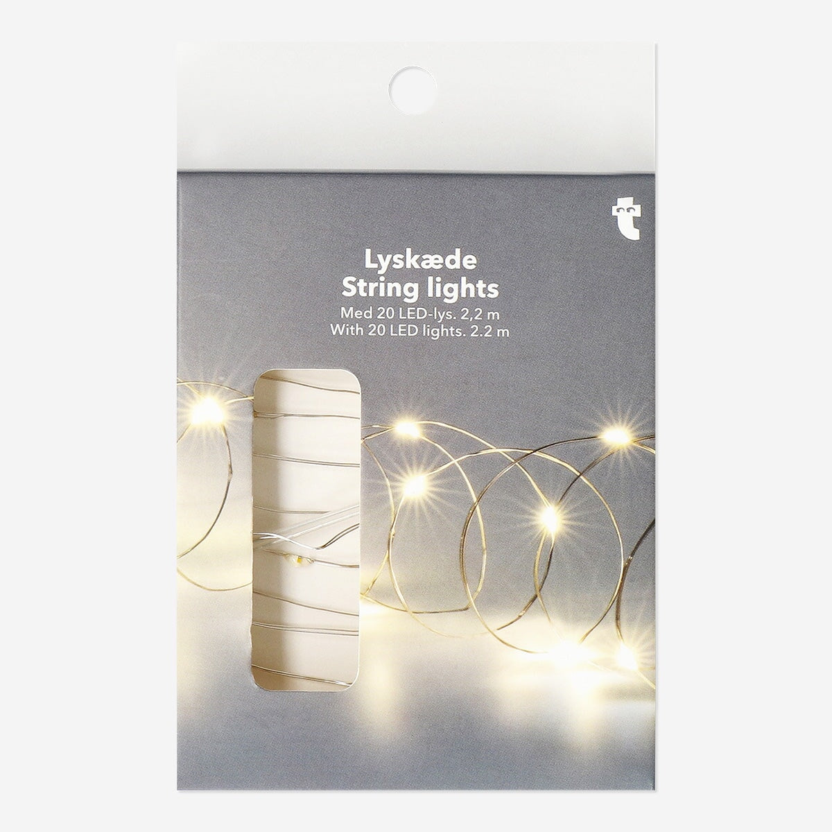 Silver string lights for home decor, 220 cm long, by Flying Tiger Copenhagen, shown hanging on a wall for cozy ambiance.