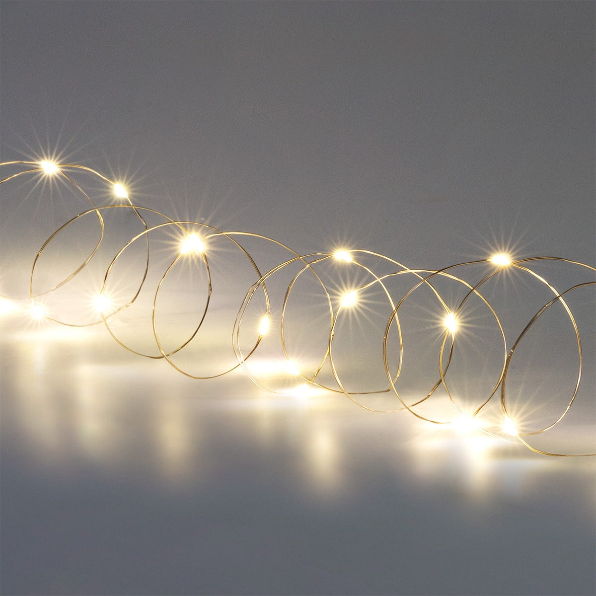 Silver string lights from Flying Tiger Copenhagen, 220 cm long, ideal for home decor and creating cozy lighting atmospheres.