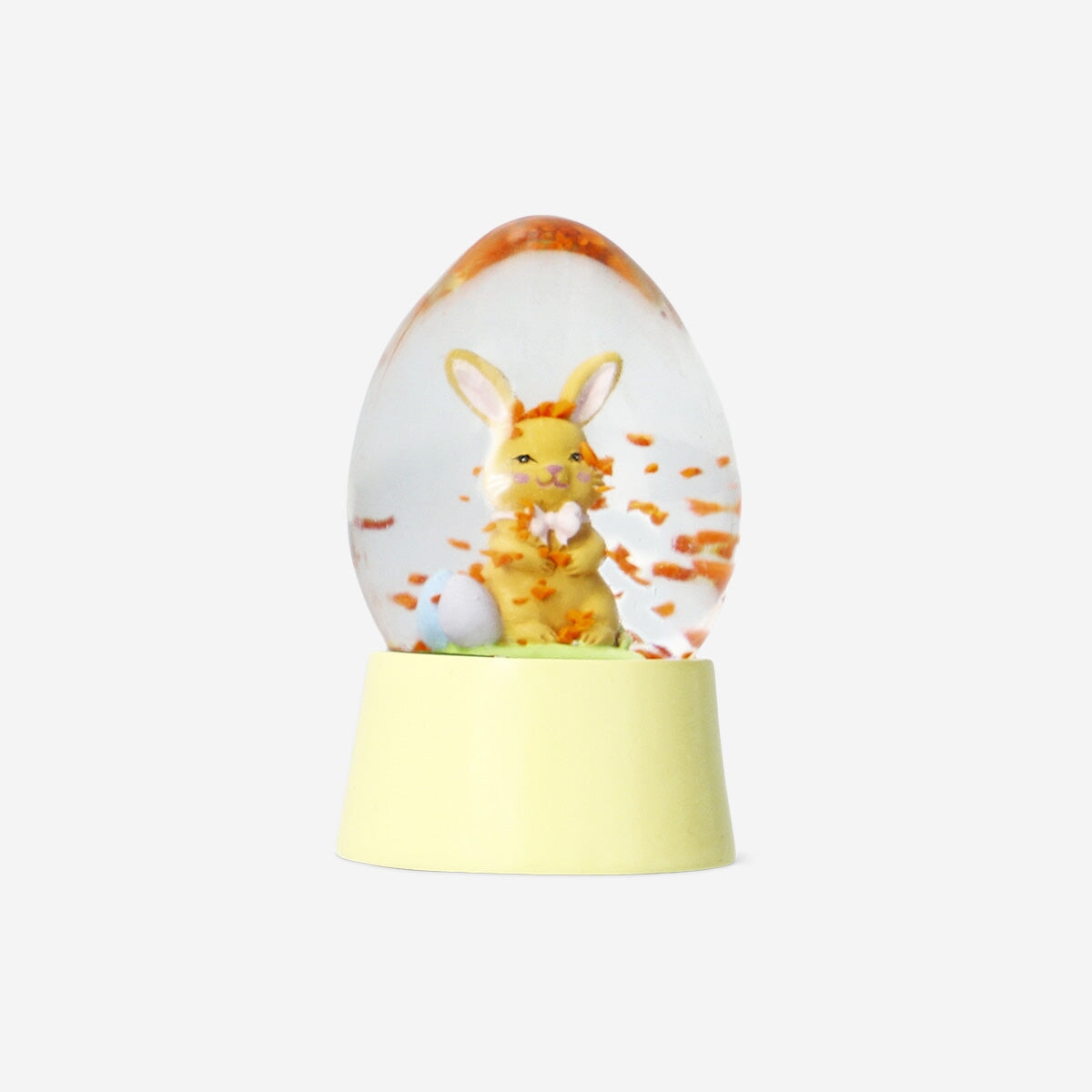 Flying Tiger Copenhagen snow globe featuring an Easter bunny with festive decorations inside.