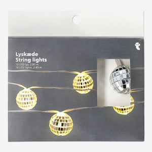 Flying Tiger Copenhagen string lights with hanging disco balls, perfect for home decor and ambient lighting.
