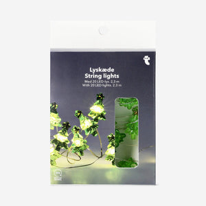 Flying Tiger Copenhagen string lights with decorative Christmas tree designs for festive home decor and holiday ambiance.