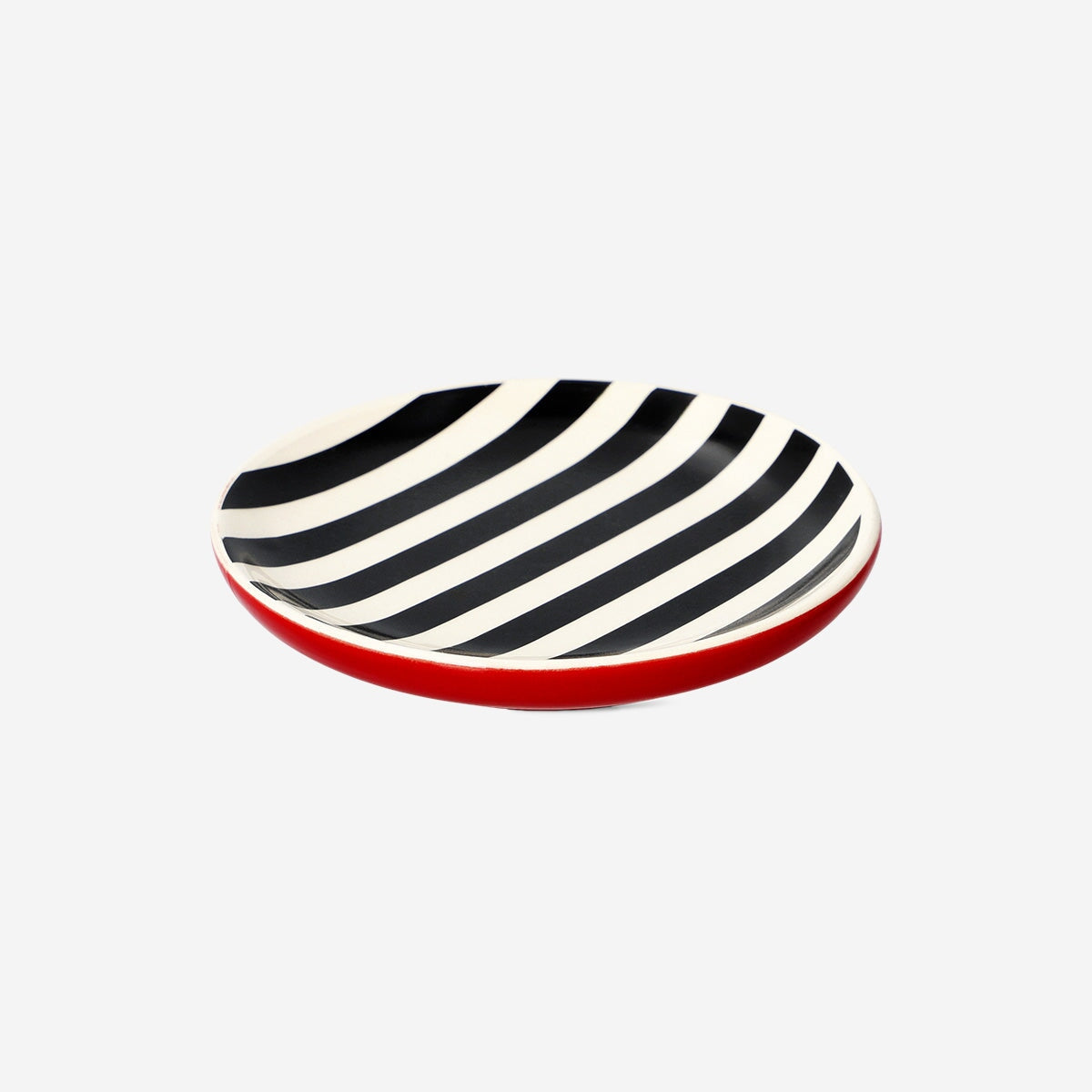 Black and white striped ceramic trinket tray from Flying Tiger Copenhagen for home decor or jewelry organization.