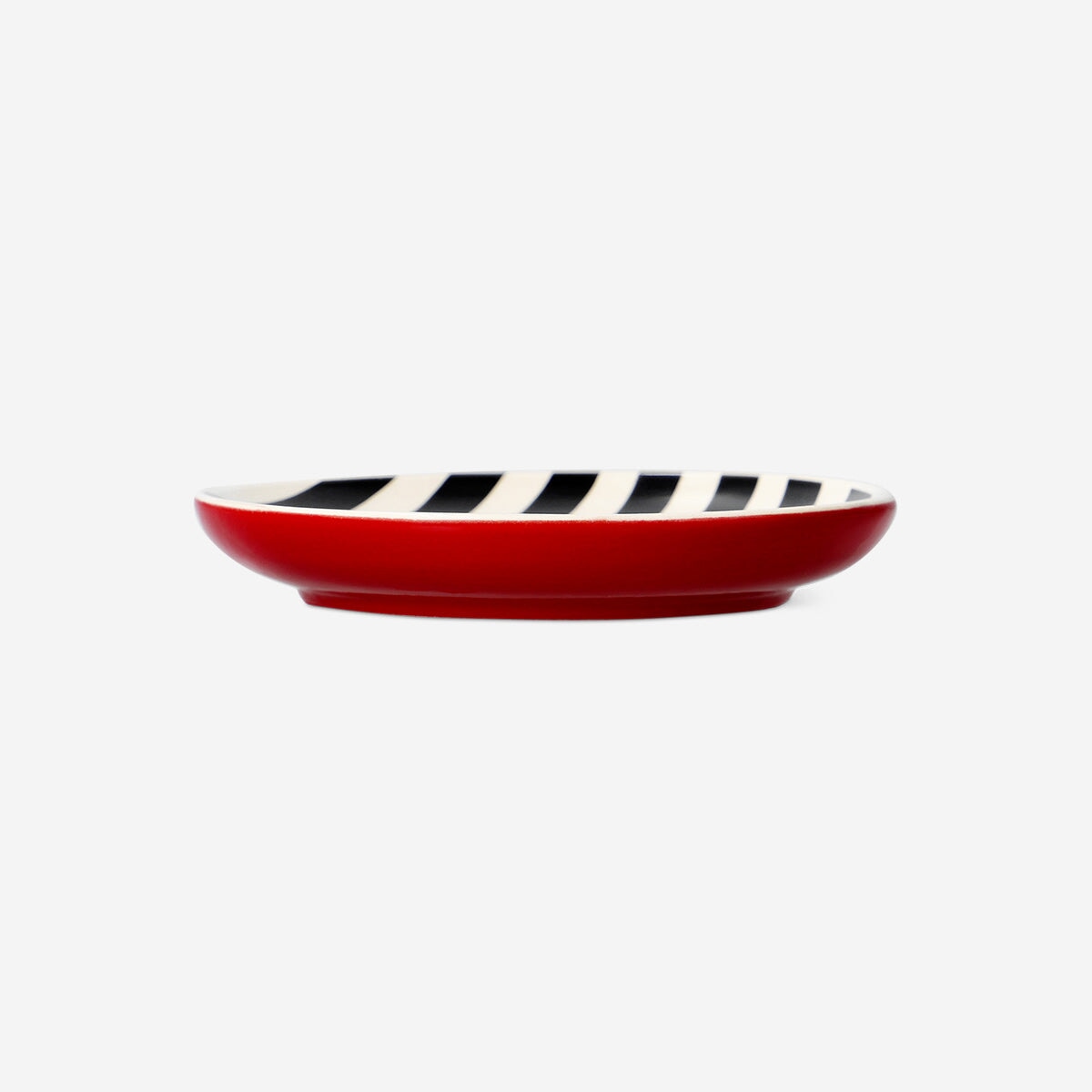 Black and white striped trinket tray from Flying Tiger Copenhagen, perfect for organizing small items at home.