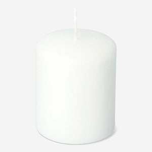 White rustic pillar candle from Flying Tiger Copenhagen, 8 cm tall, ideal for home decor and cozy ambiance.