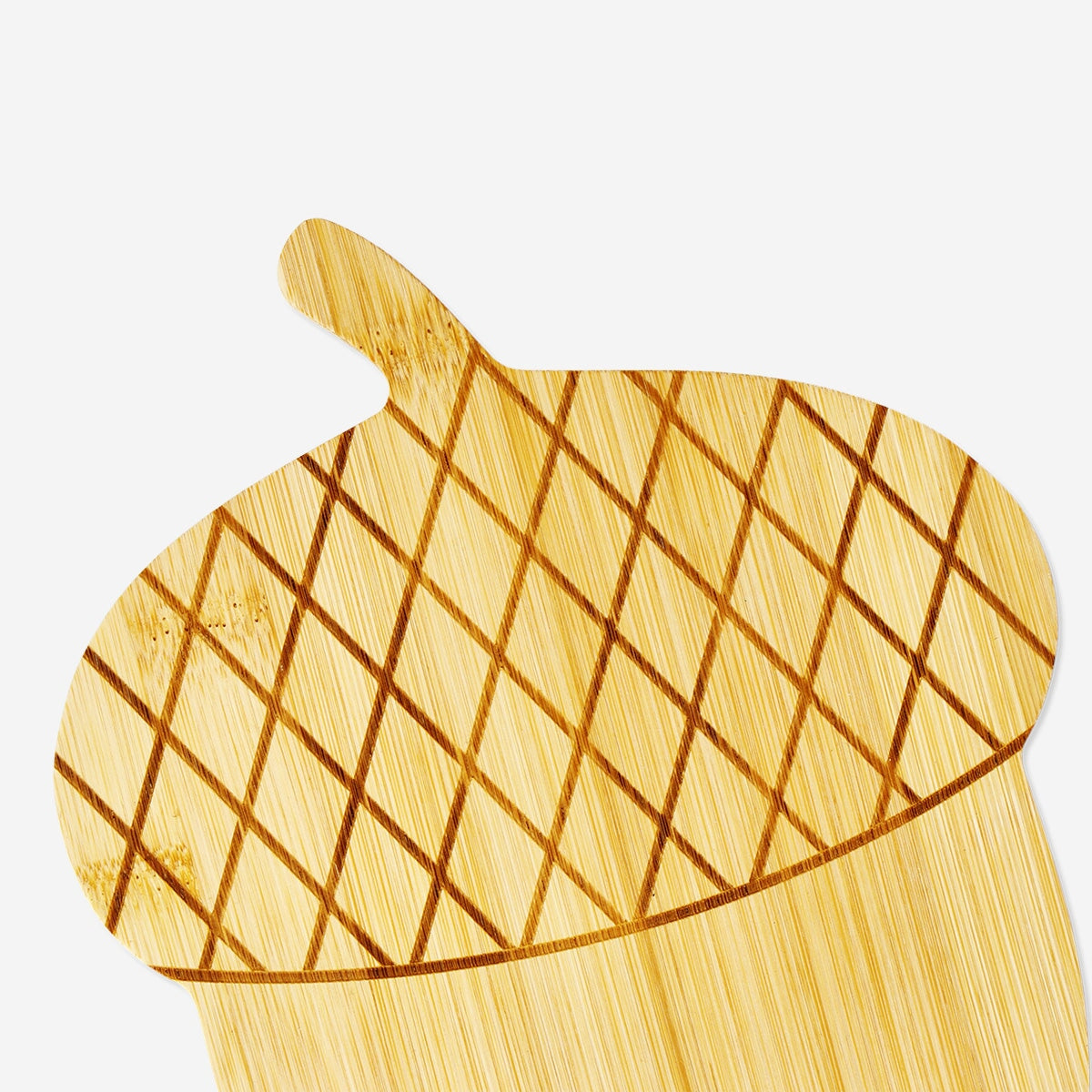 Bamboo cutting board with acorn design from Flying Tiger Copenhagen, ideal for kitchen food prep and serving.