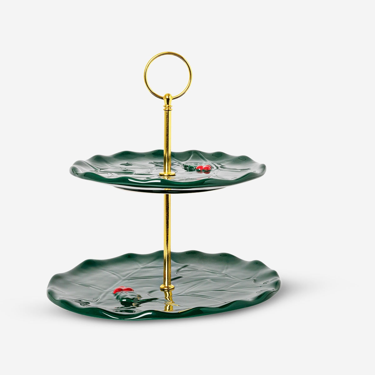 Cake stand with embossed holly pattern, Flying Tiger Copenhagen kitchenware, showcasing a decorative and functional dessert display.