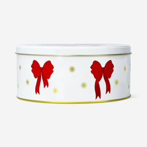 Christmas cake tin with bow print, 20 cm, from Flying Tiger Copenhagen, featuring festive holiday design and durable metal construction.
