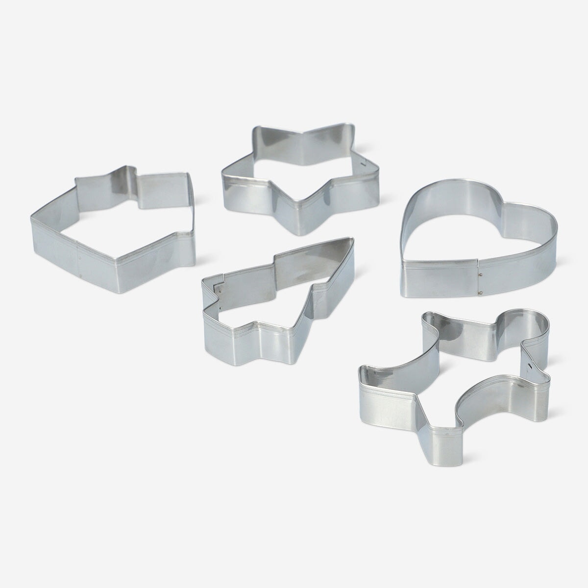 Set of five Flying Tiger Copenhagen kitchen cookie cutters in various fun shapes for baking and decorating cookies.