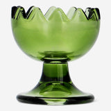 Glass egg cup from Flying Tiger Copenhagen, kitchen accessory, showcasing a clear, smooth glass egg holder for breakfast.