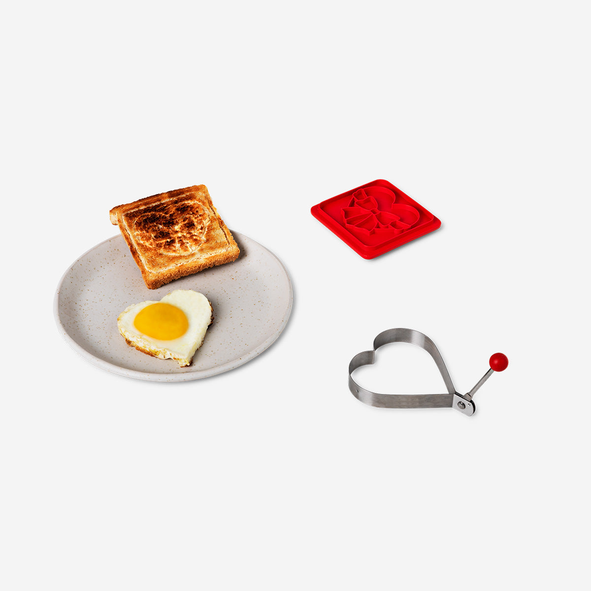 Egg mold with toast stamp from Flying Tiger Copenhagen, showing a kitchen tool used for shaping eggs and toasting bread.