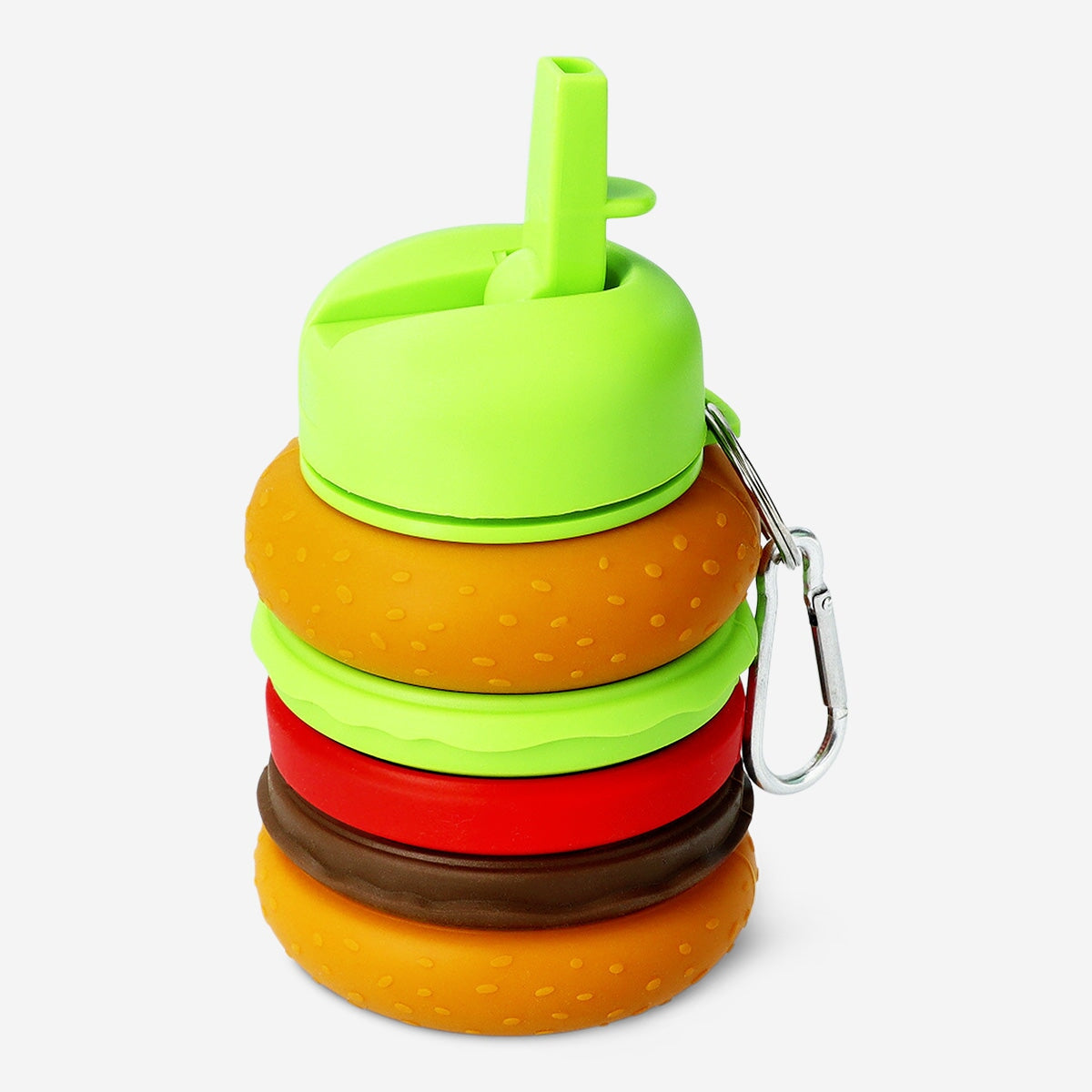 Foldable burger-shaped drinking bottle in 600 ml size, made by Flying Tiger Copenhagen, shown in a kitchen setting.