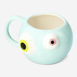 Coffee mug with eyeball design, 450 ml capacity, from Flying Tiger Copenhagen, used as a quirky kitchen accessory.