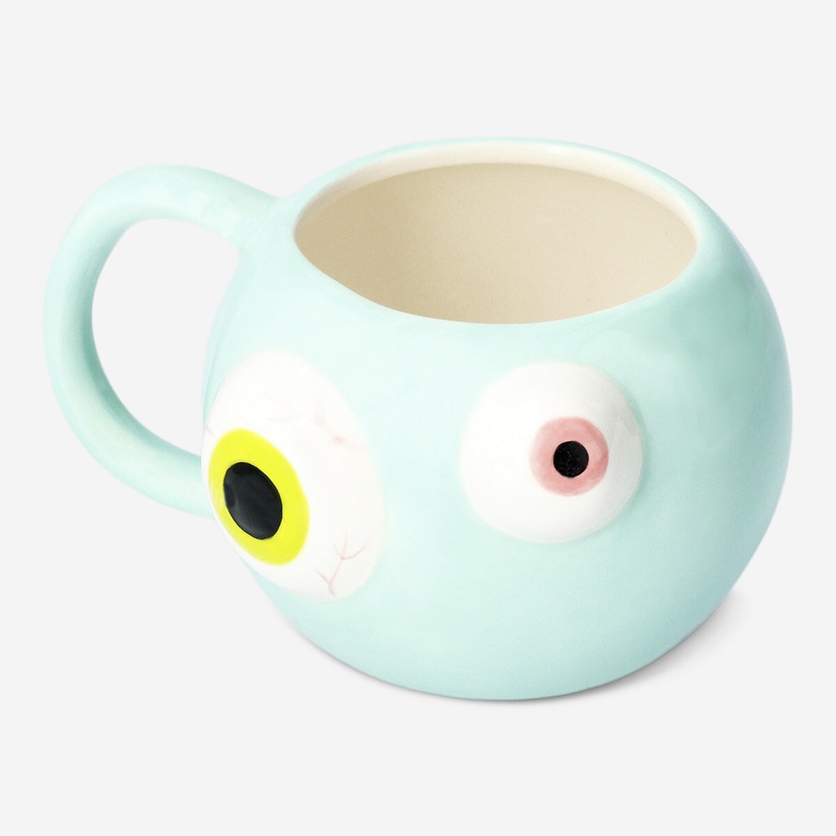 Coffee mug with eyeball design, 450 ml capacity, from Flying Tiger Copenhagen, used as a quirky kitchen accessory.