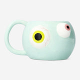 Flying Tiger Copenhagen 450 ml mug with eyeballs, kitchenware featuring a spooky eyeball design on a ceramic mug.