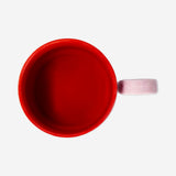 Pink ceramic mug with candy cane design, 300 ml capacity, from Flying Tiger Copenhagen kitchen collection.